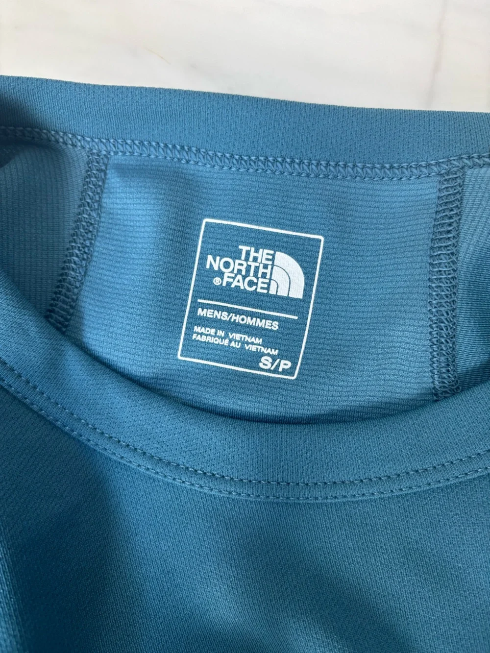 The North Face men’s  Long-Sleeve Crew Tee in Teal